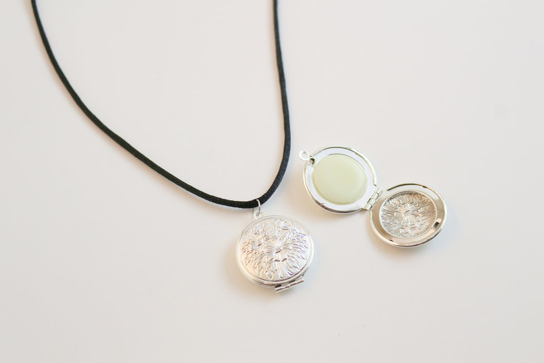 Solid Perfume Locket Necklace (Silver Circular Locket on Black Leather Cord)